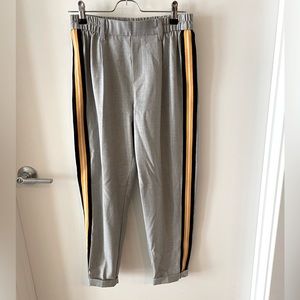 Bershka streetwear gray trousers with sporty stripes on the sides.